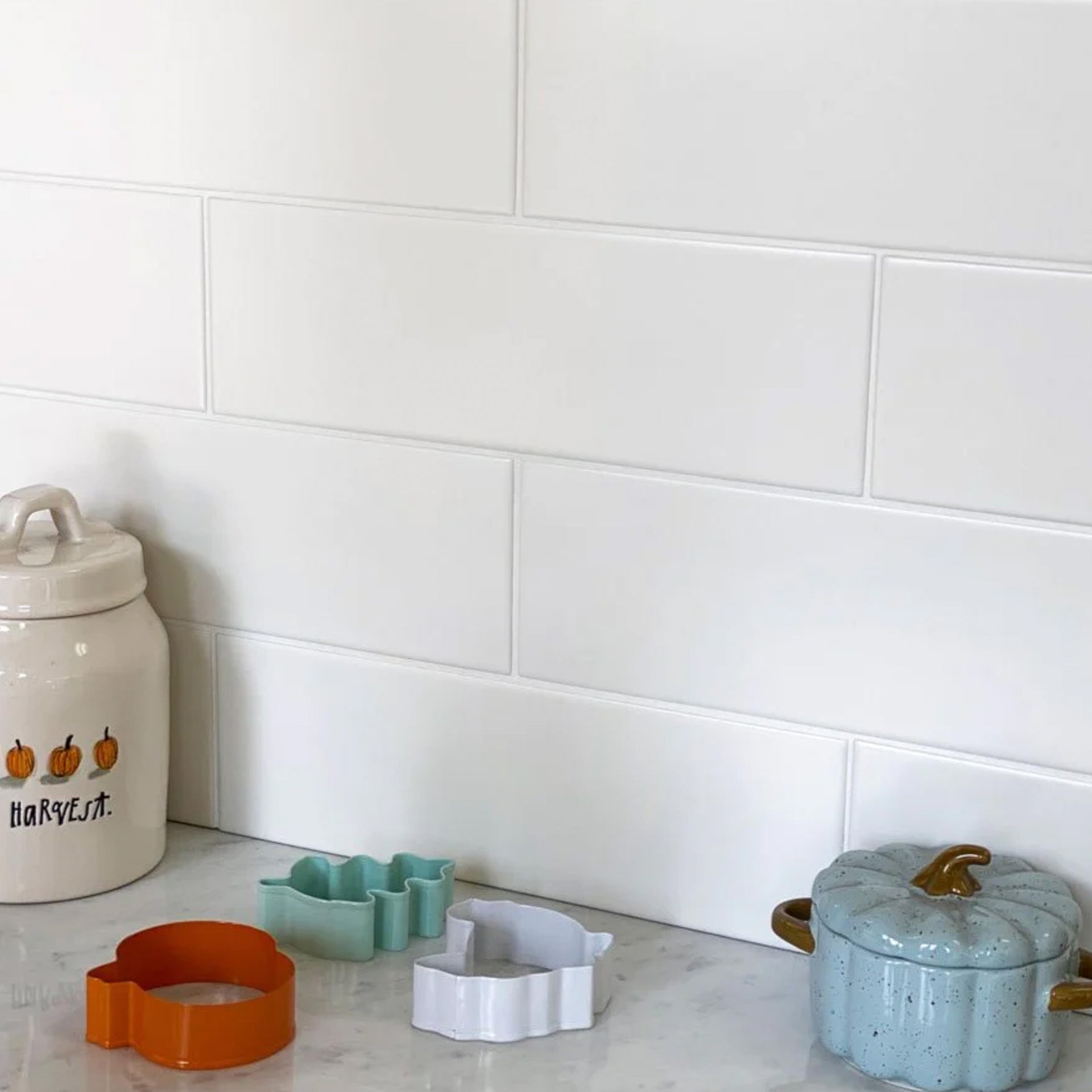 white matte tile backsplash